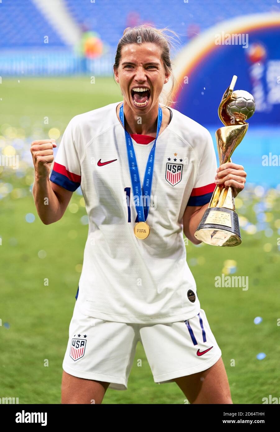 USA's Tobin Heath celebrates with the FIFA Women's World Cup Trophy