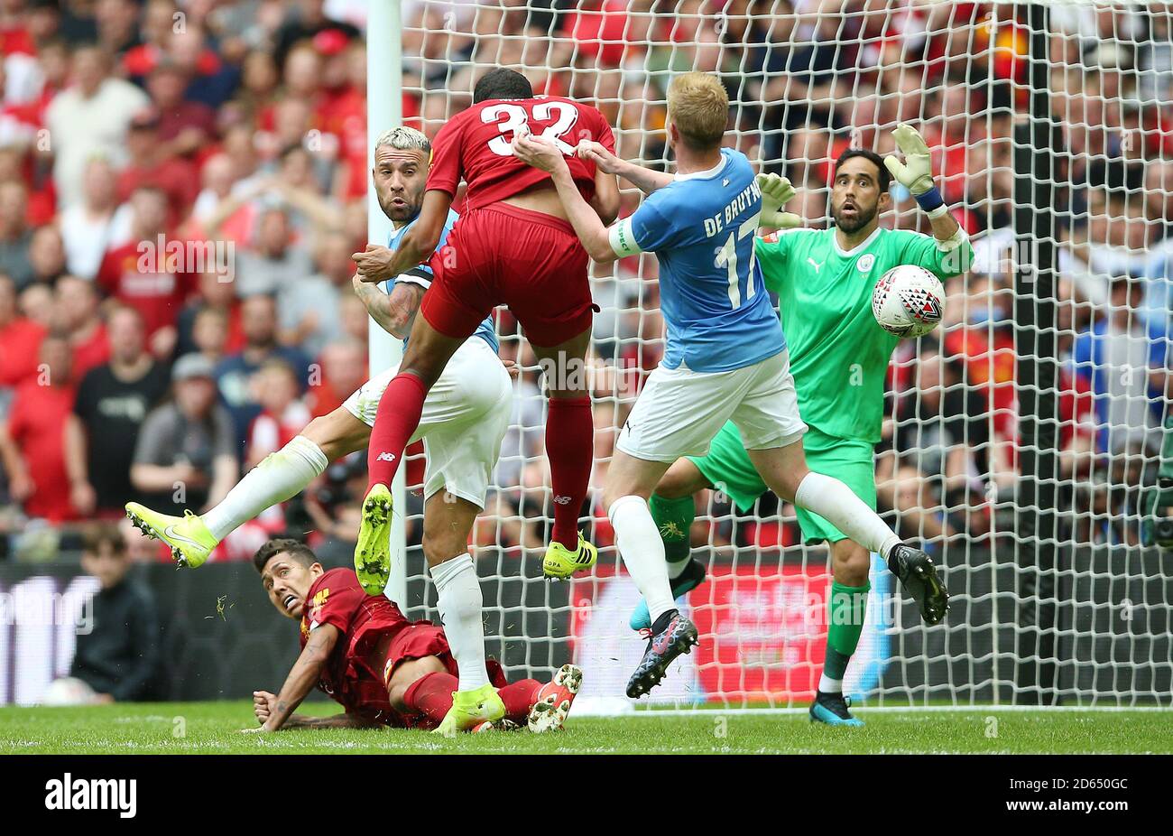 Liverpool's Joel Matip scores his side's first goal of the game Stock Photo