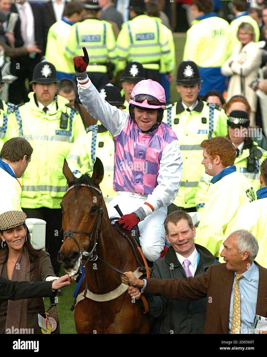 Robert Thornton on Voy Por Ustedes celebrates winning the Seasons Holidays Queen Mother Champion Chase (Grade 1) Stock Photo
