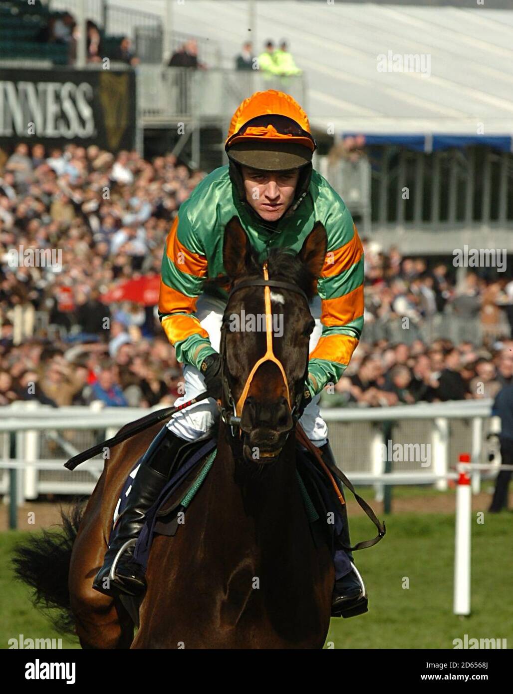 Catch Me ridden by Barry Geraghty going to post in the Ballymore Properties Novices' Hurdle (Grade 1) Stock Photo