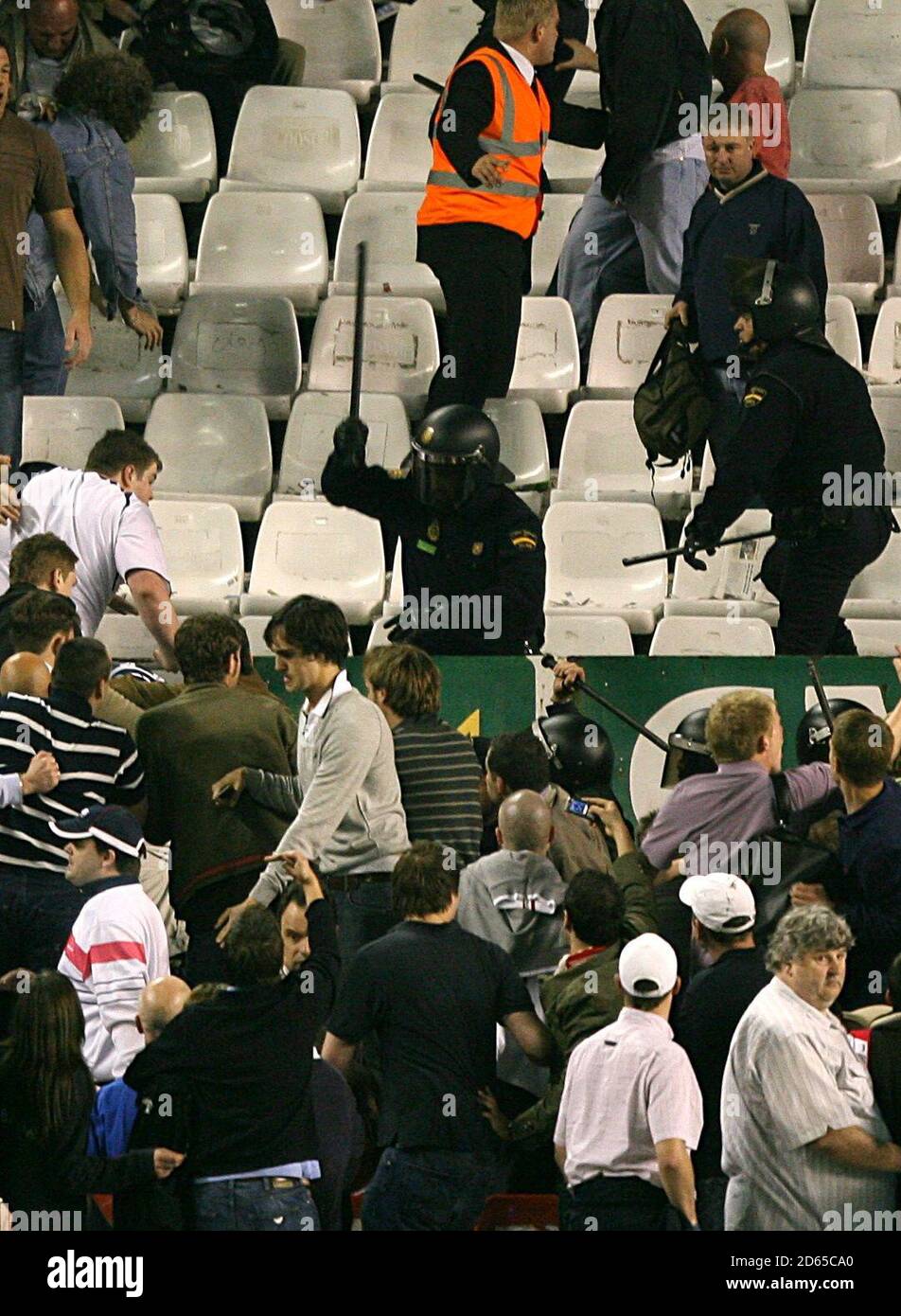 Spurs Fans Riot Tottenham Hotspur fans clash with police in the stands Stock Photo - Alamy