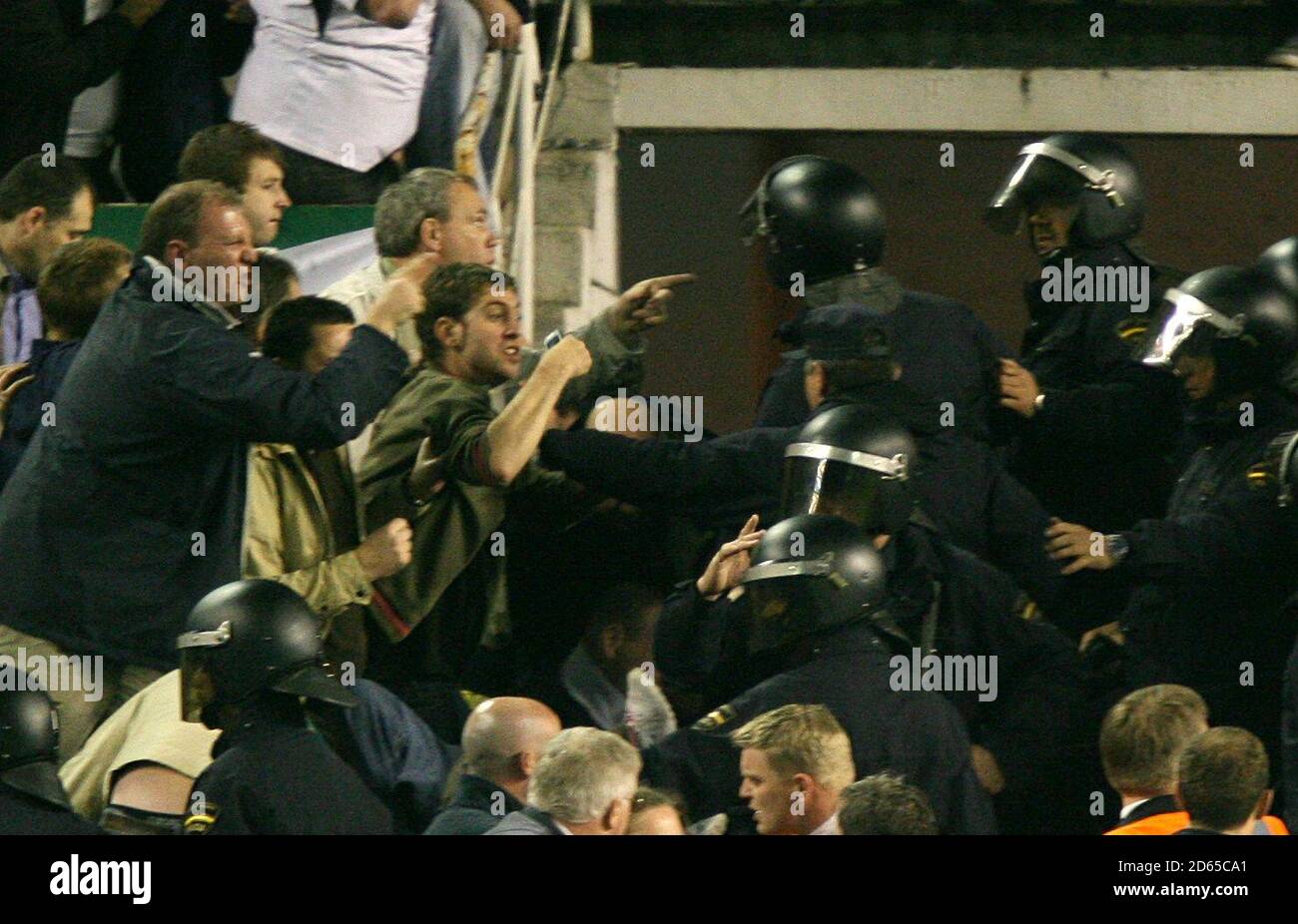 Spurs Fans Riot Police and fans clash in the stands hi-res stock photography and images ...