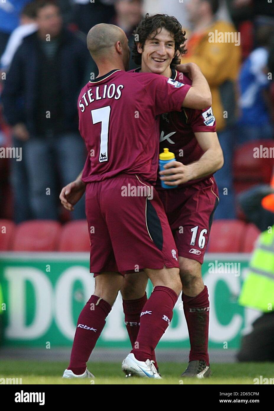 Bolton Wanderers Andranik Teymourian and Stelios Giannakopoulos celebrate victory at the end of the game Stock Photo