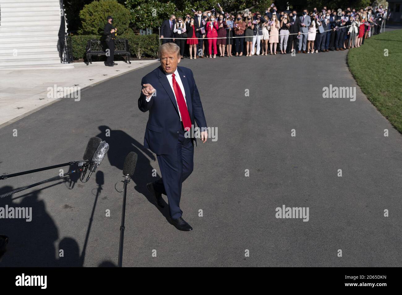 Washington, United States. 14th Oct, 2020. U.S. President Donald J. Trump speaks to the media as he departs the White House enroute to a political event in Des Moines, Iowa, in Washington DC, on Wednesday, October 14, 2020. Photo by Chris Kleponis/UPI Credit: UPI/Alamy Live News Stock Photo