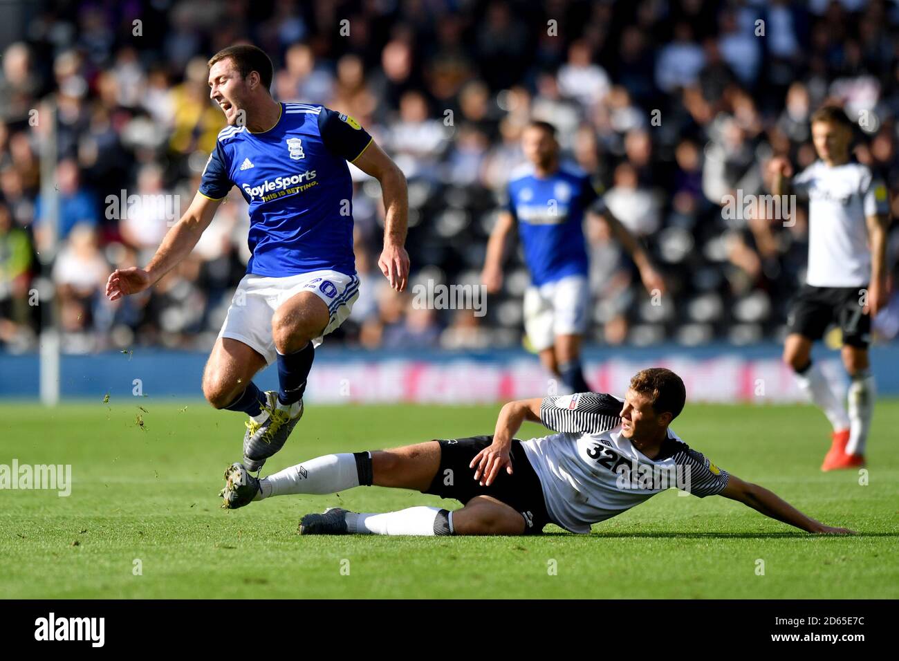 Birmingham City's Gary Gardner is tackled by Derby County's Krystian Bielik Stock Photo