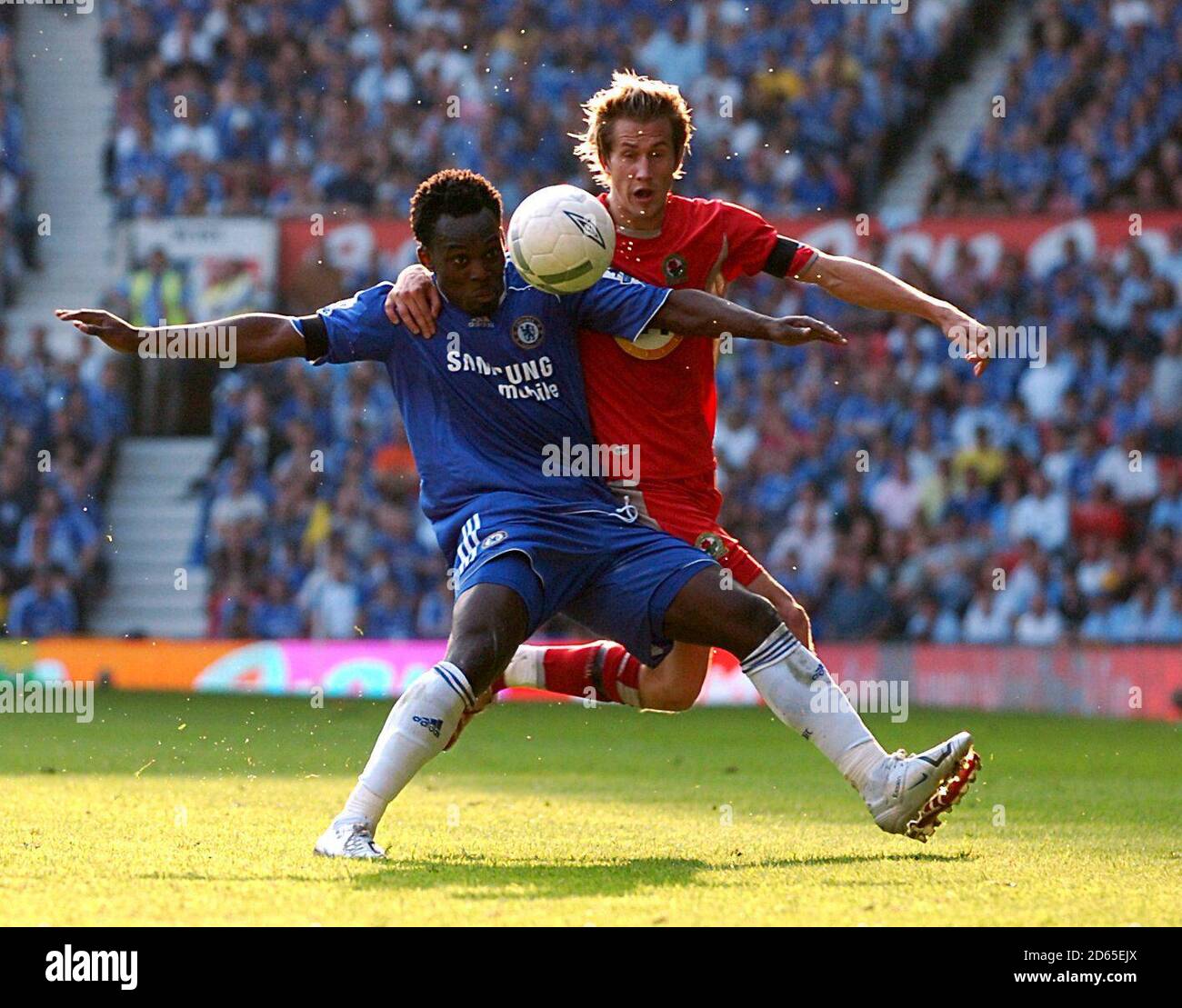 Chelsea's Michael Essien and Blackburn Rovers' Morten Gamst Pedersen battle for the ball Stock Photo