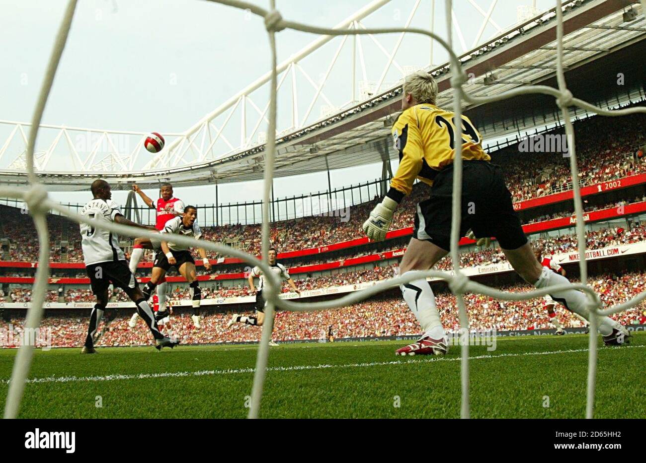 Arsenal's Cesar Julio Baptista heads in the opening goal of the match Stock Photo