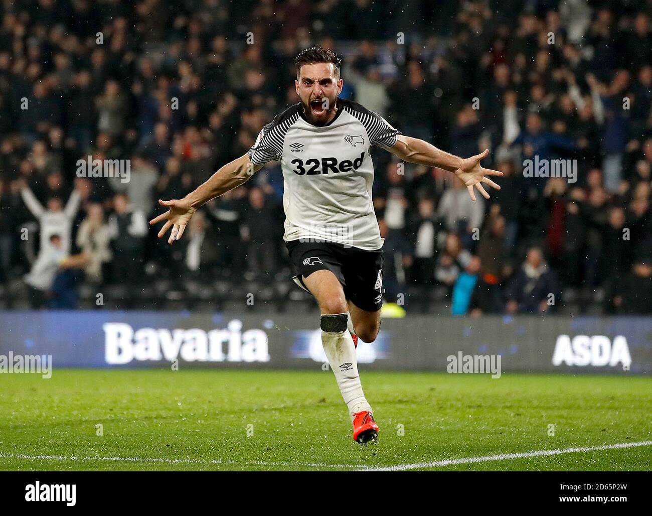 Derby County's Graeme Shinnie celebrates scoring his side's first goal ...