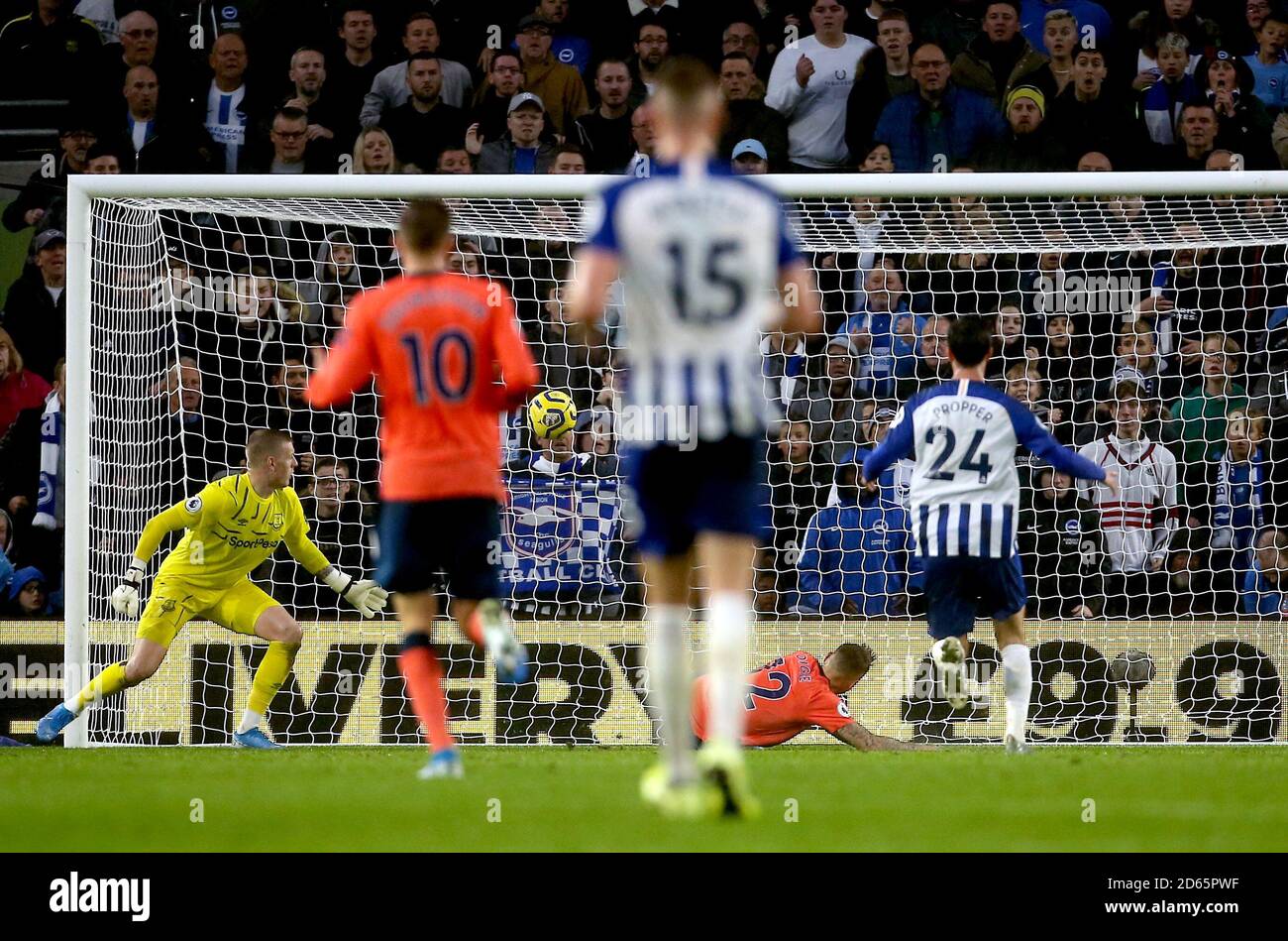 Everton's Lucas Digne (second right, floor) scores an own goal in the 90th minute to put Brighton and Hove Albion 3-2 up Stock Photo