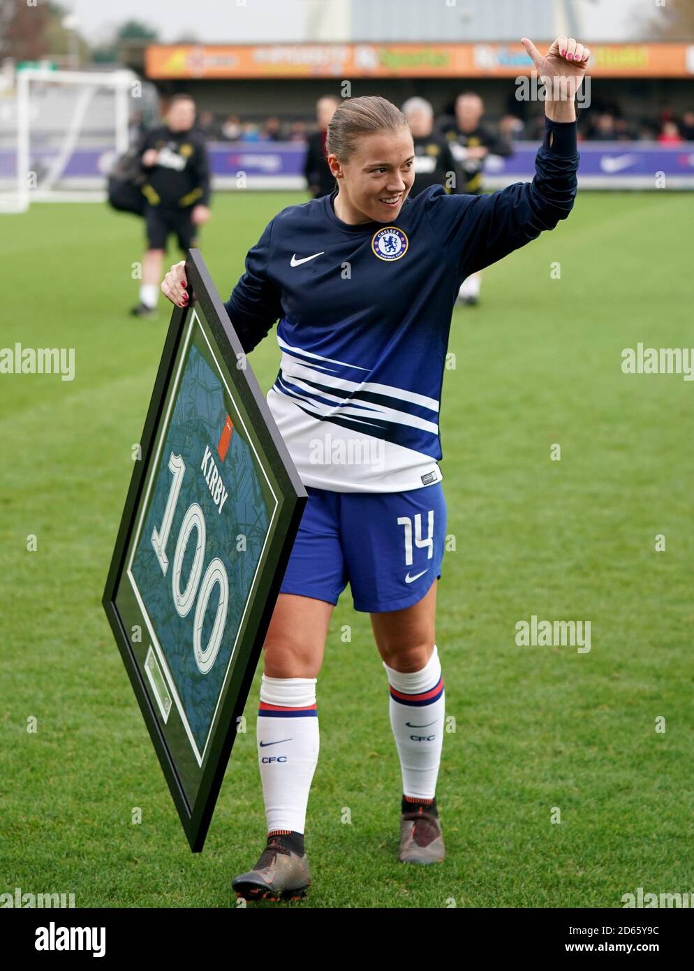Chelsea s Fran Kirby with a commemorative shirt for her 100th