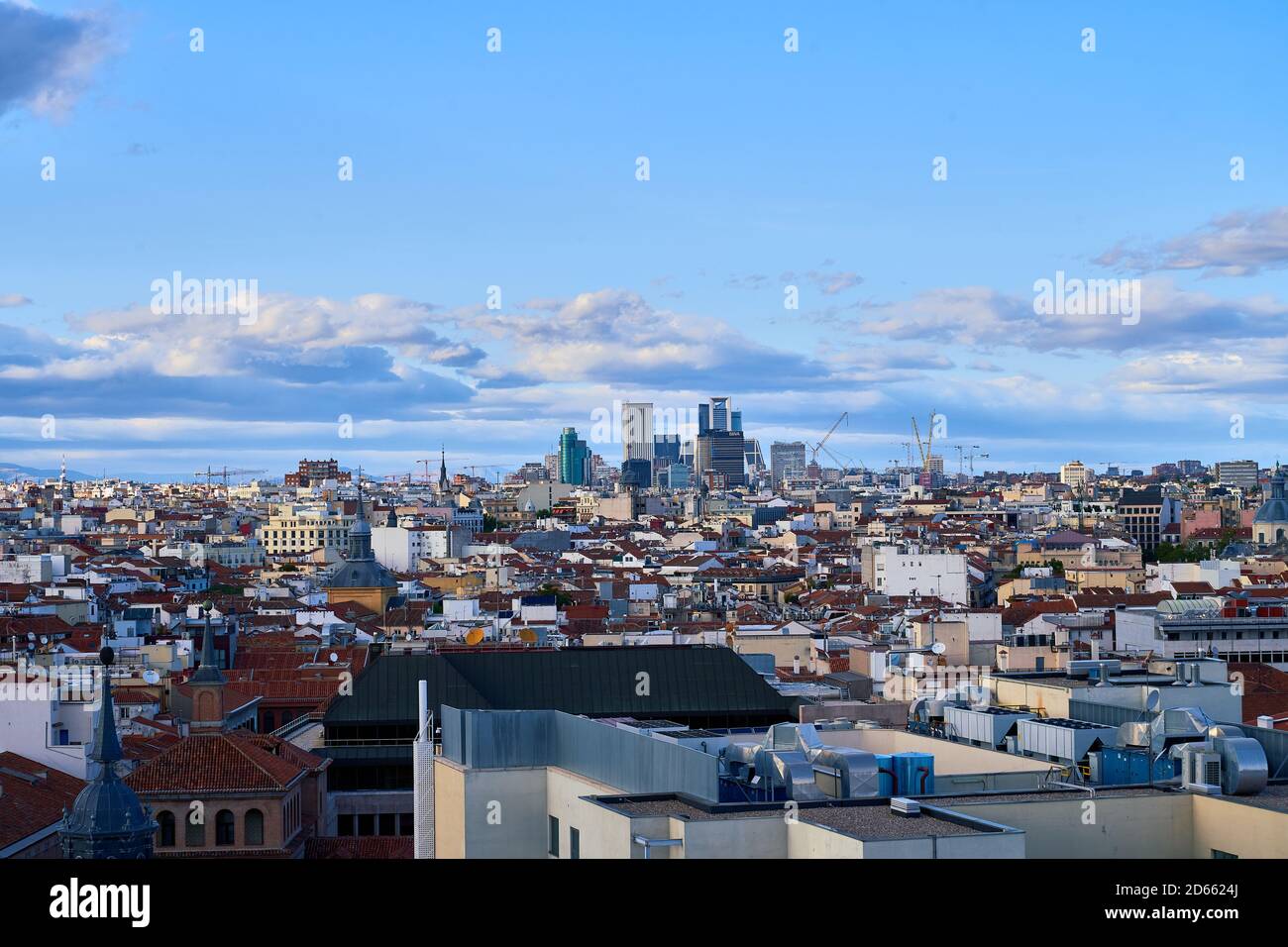 View from the Circulo de bellas artes across the rooftops towards the mountains, Madrid, Spain, September 2020 Stock Photo