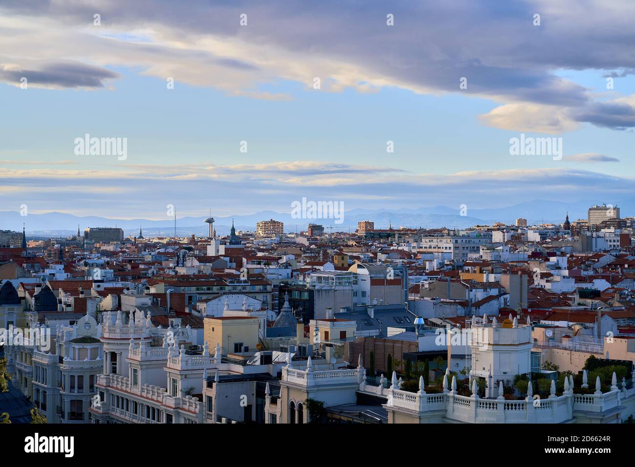 View from the Circulo de bellas artes across the rooftops towards the mountains, Madrid, Spain, September 2020 Stock Photo