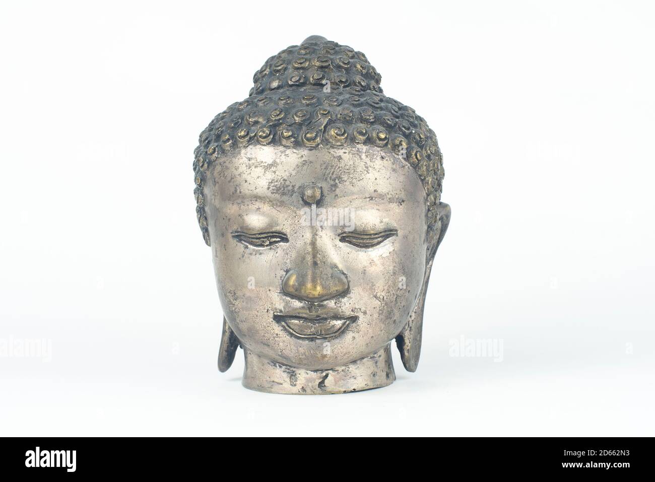 isolated antique silver Buddha statue Stock Photo