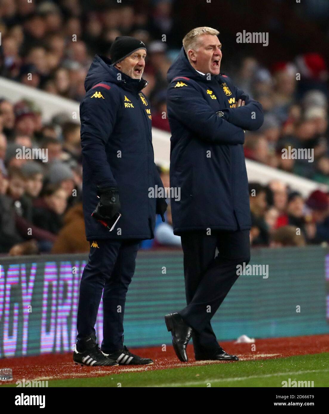 Aston Villa manager Dean Smith (right) yells from the touchline Stock Photo