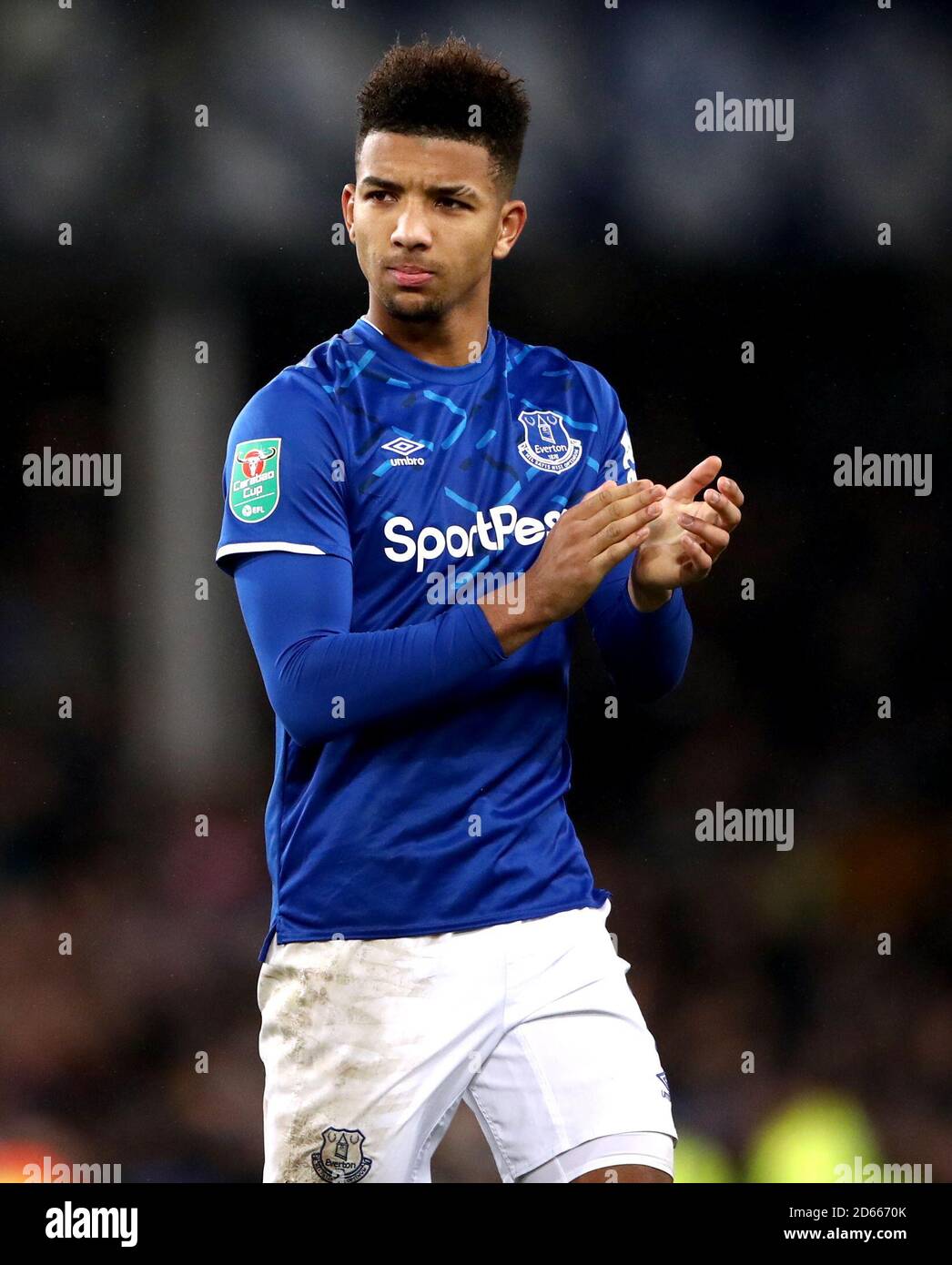Everton's Mason Holgate applauds the fans at the end of the match Stock Photo