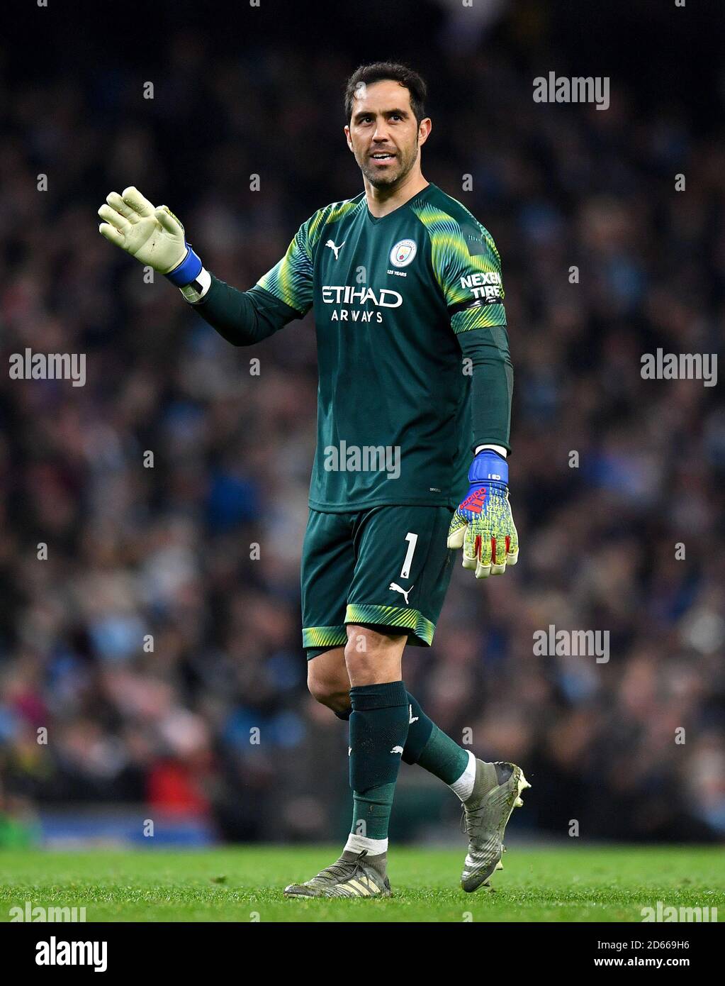 Manchester City goalkeeper Claudio Bravo celebates his side's second goa Stock Photo