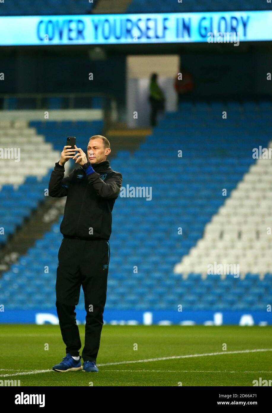Everton first team coach Duncan Ferguson inspects the pitch Stock Photo