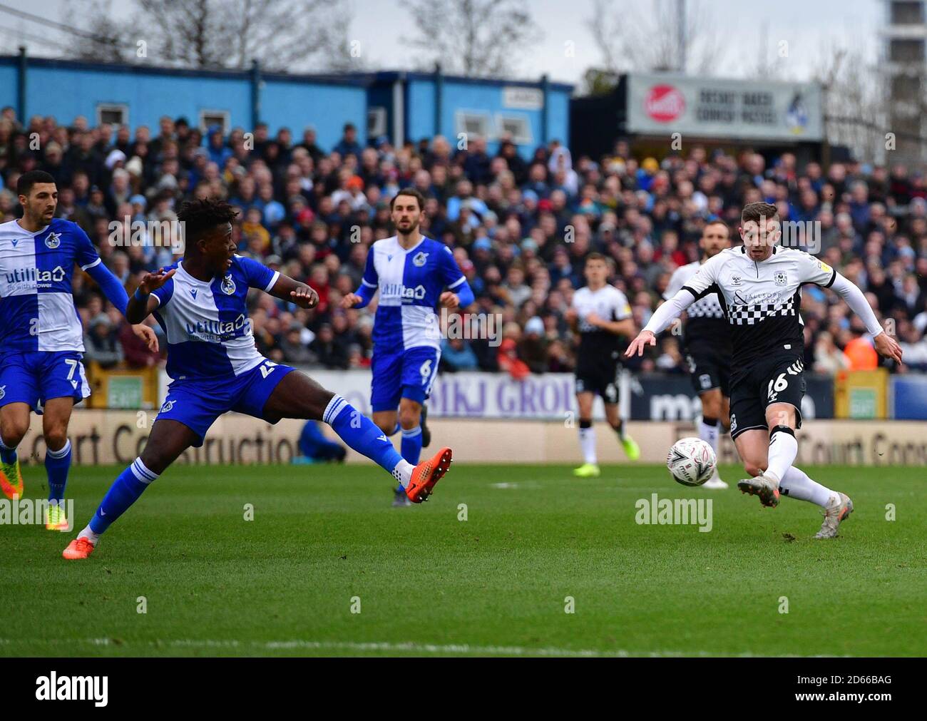 Coventry City's Jordan Shipley (right) shoots towards goal Stock Photo