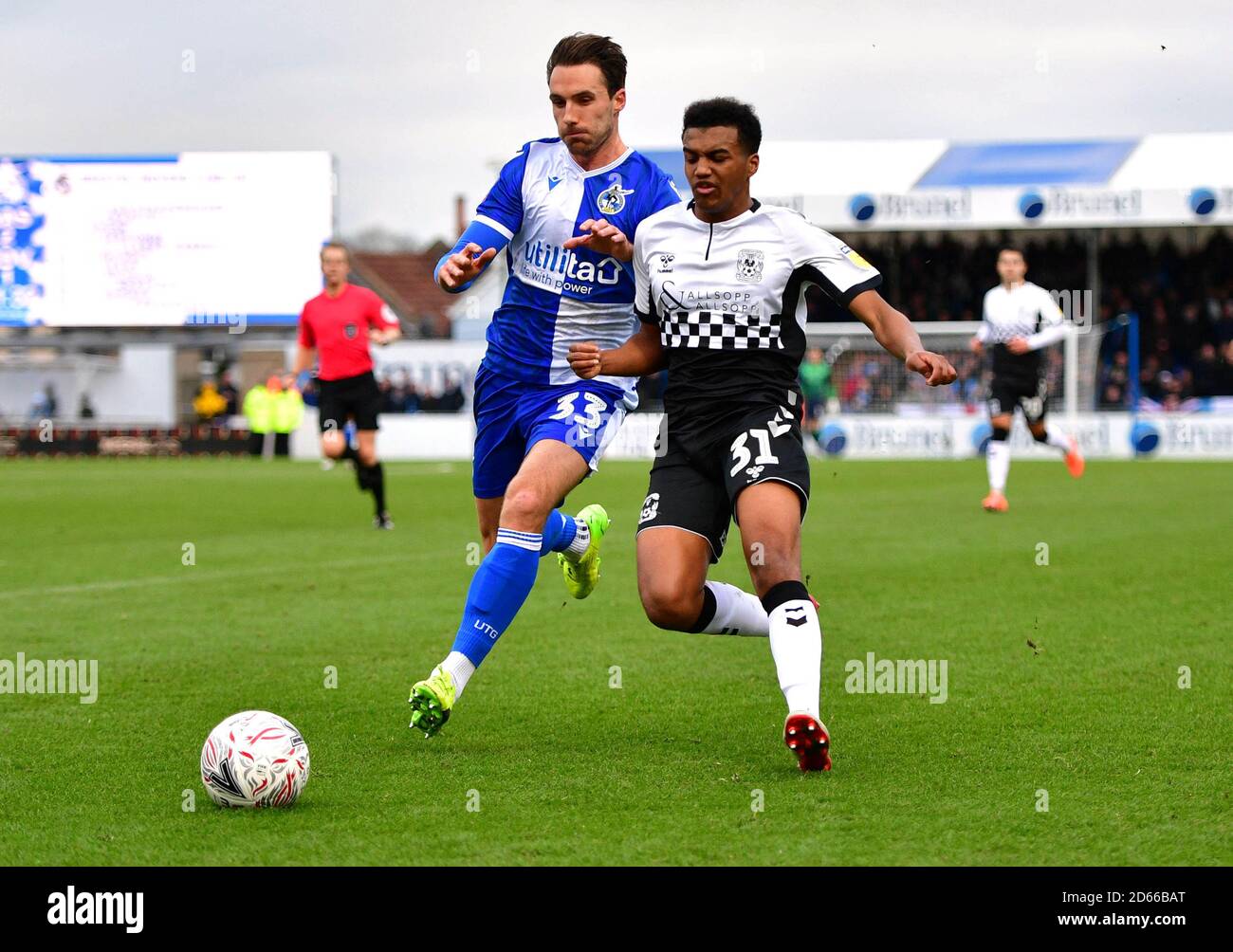 Bristol Rovers Alex Rodman (left) and Coventry City's Sam McCallum battle for the ball Stock Photo