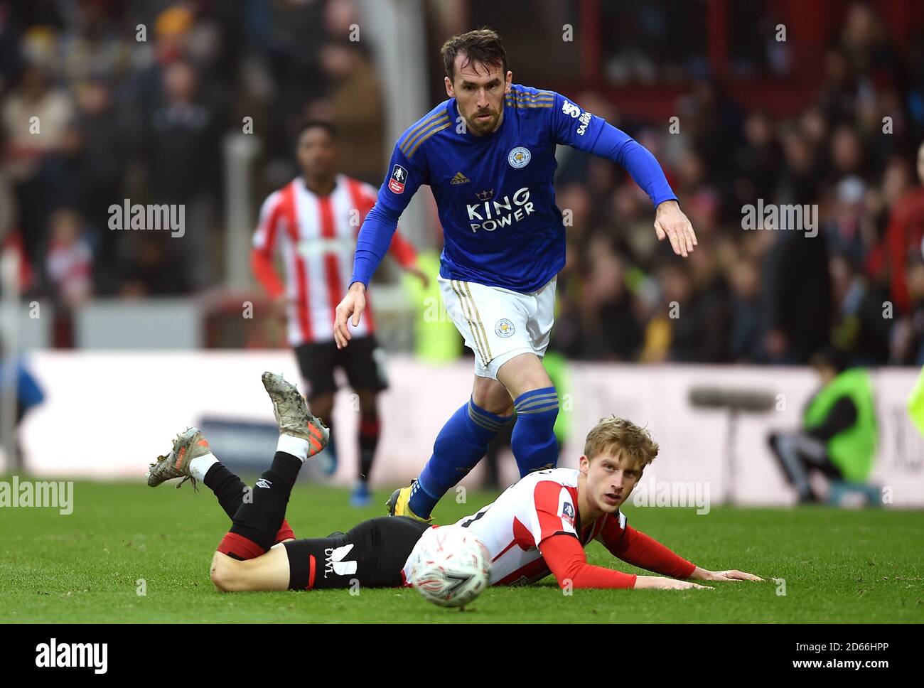 Brentford's Mads Roerslev Rasmussen (right) and Leicester City's Christian Fuchs battle for the ball Stock Photo