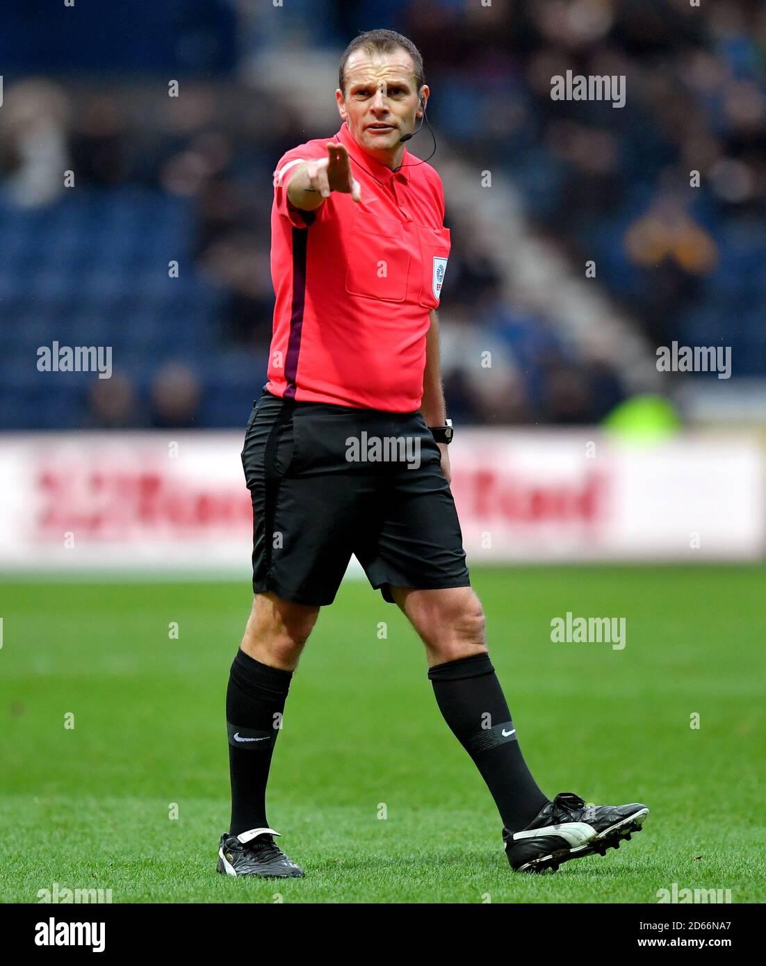 Referee Geoff Eltringham gestures on the pitch Stock Photo - Alamy