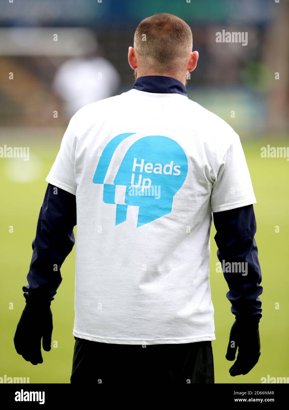 Derby County's Wayne Rooney wears a Heads Up tshirt in support of the