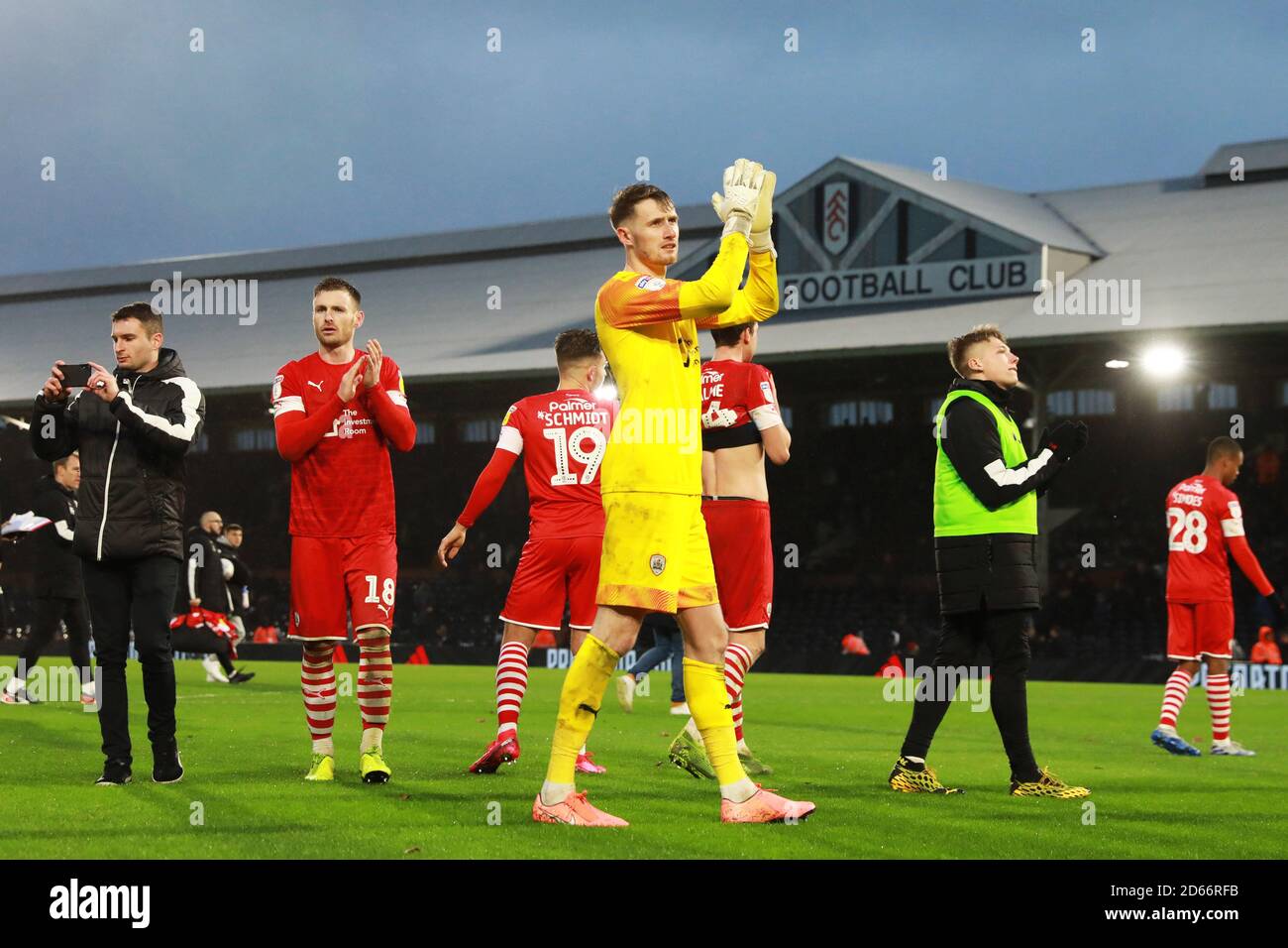 Barnsley's Brad Collins (centre) celebrates at full time Stock Photo