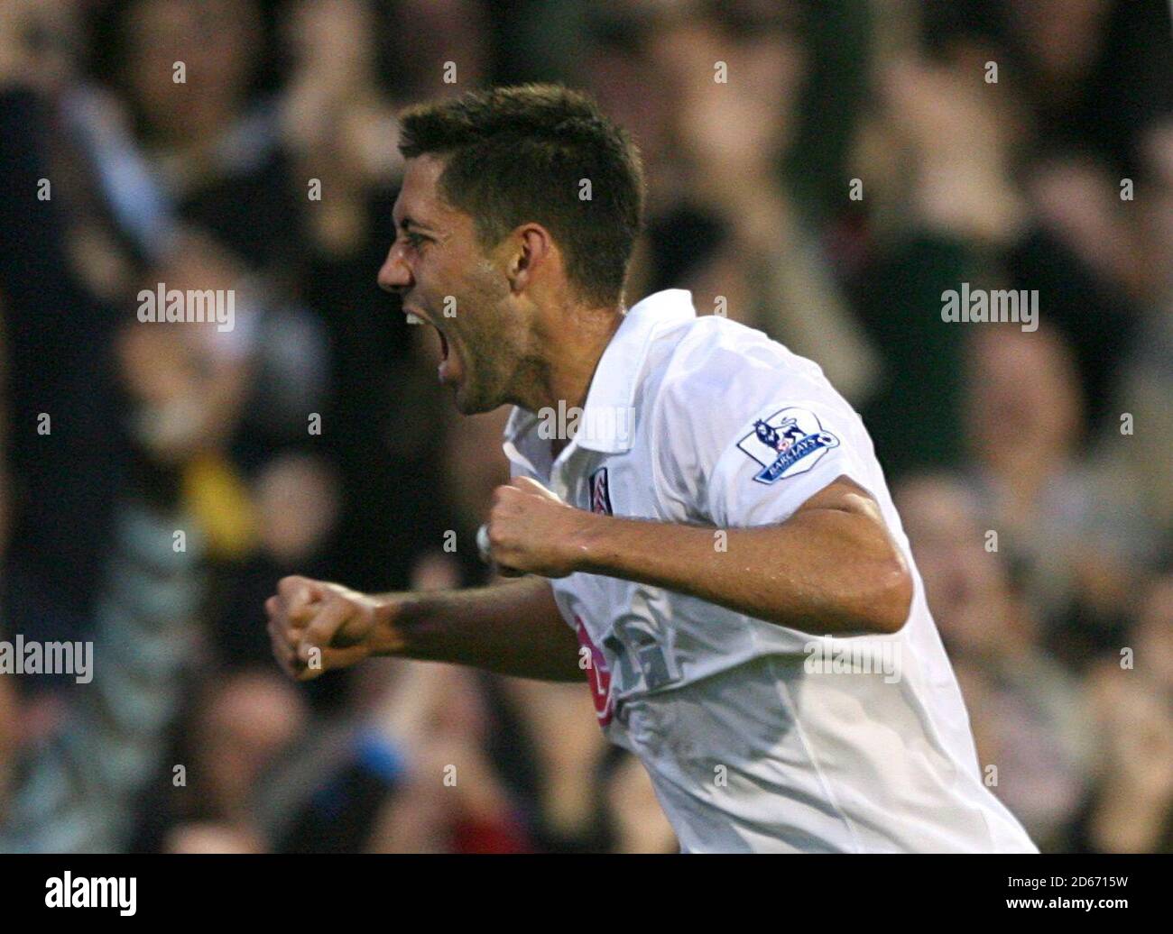 Fulham's Clint Dempsey celebrates scoring his sides second goal of the game Stock Photo
