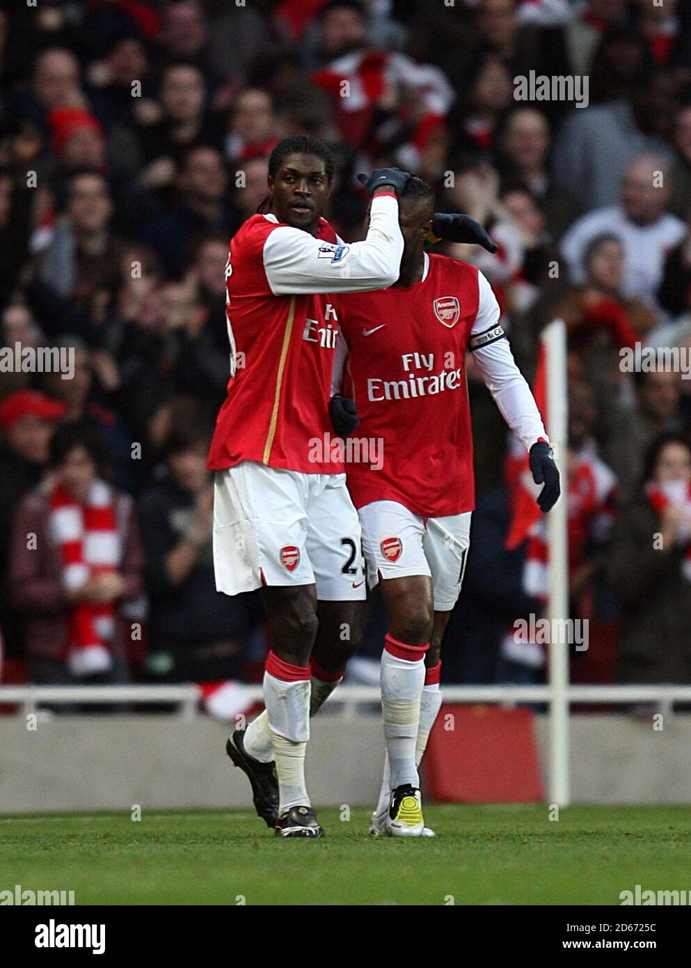 Arsenal's Emmanuel Adebayor (left) celebrates scoring the first goal of the game, with team mate William Gallas. Stock Photo