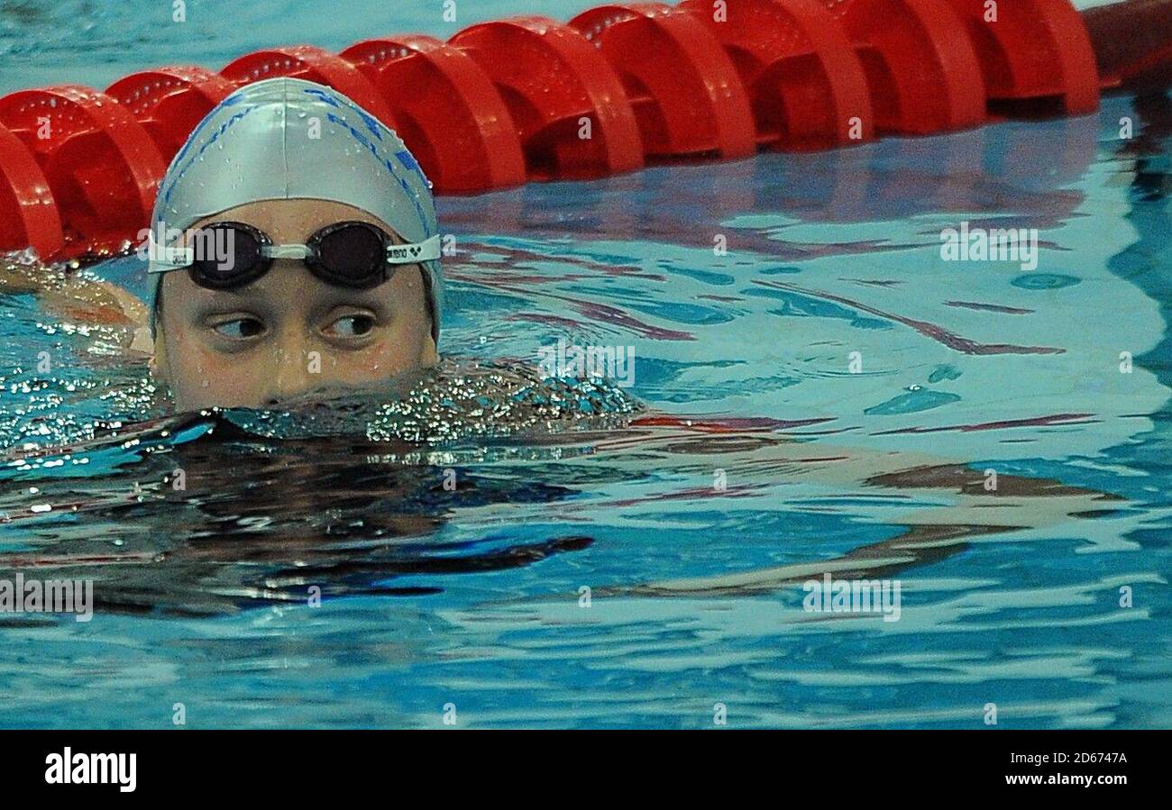 Italy's Federica Pellegrini after setting a new world record for the women's 200m freestyle duirng the Olympic heats Stock Photo
