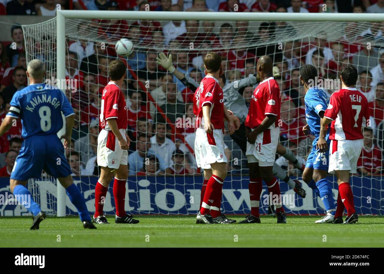Cardiff City's Graham Kavanagh bends the ball over the Forest wall to ...
