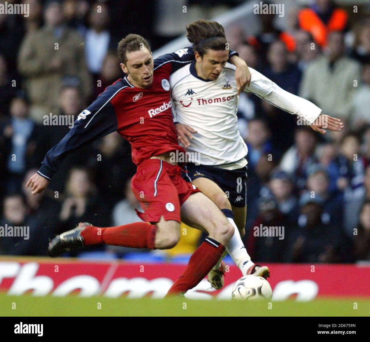 Tottenham Hotspur's Helder Postiga and Bolton Wanderers Nicky Hunt. Stock Photo