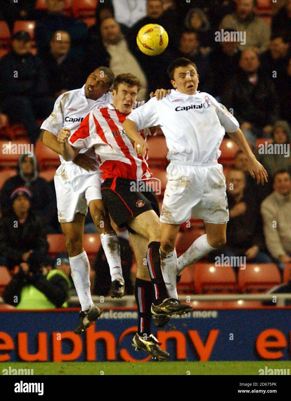 Sunderland's Kevin Kyle battles for the ball in the air with Nottingham Forest's Des Walker (l) and Gregor Robertson (r) Stock Photo