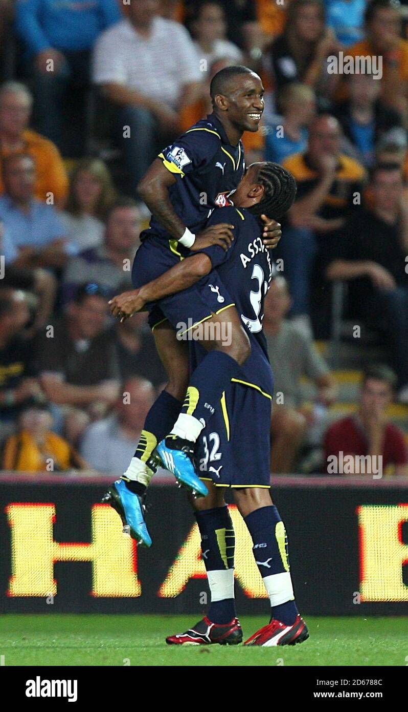 Tottenham Hotspurs' Jermain Defoe (left) celebrates scoring his sides third goal of the game with teammate Benoit Assou-Ekotto (right) Stock Photo