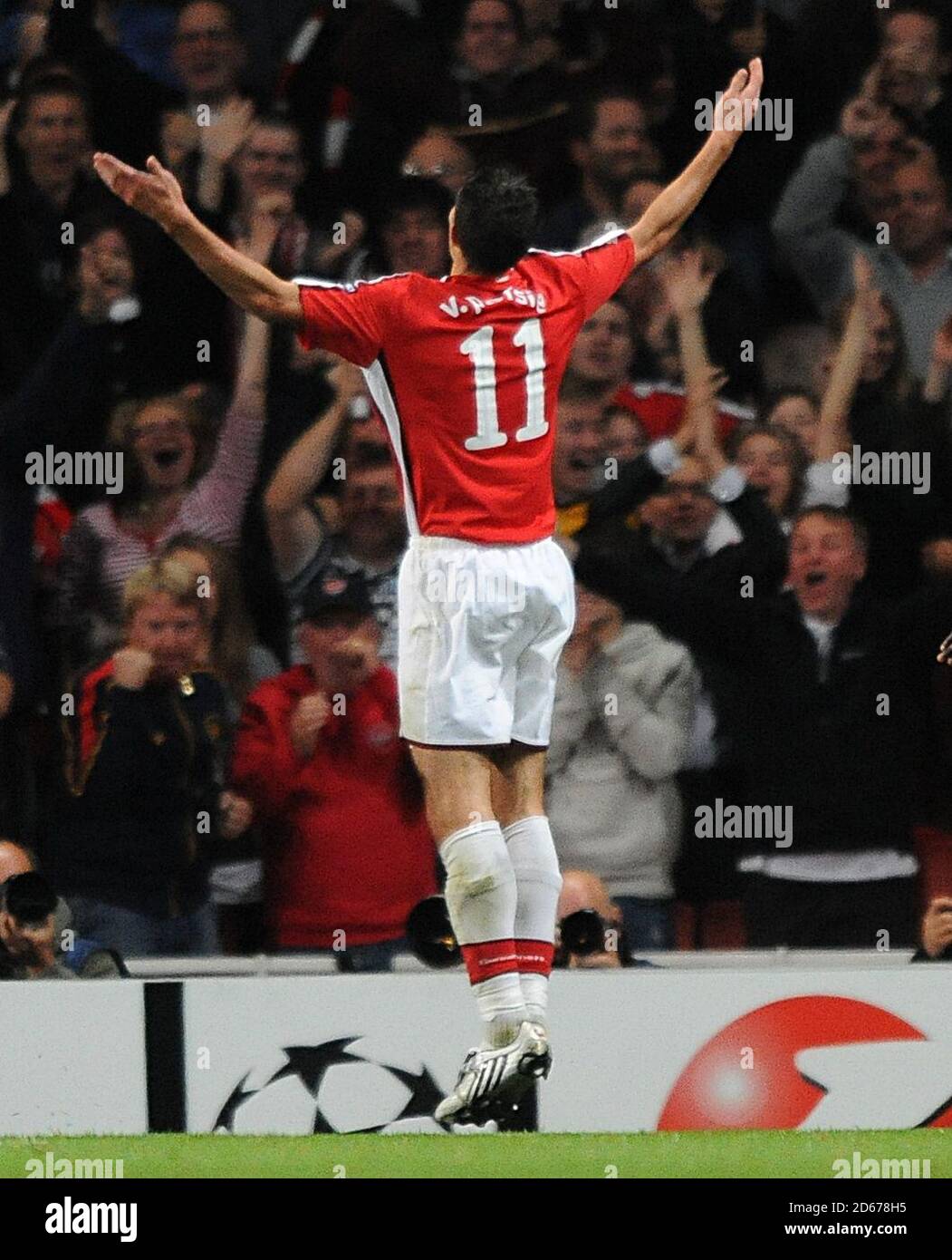 Arsenal's Robin van Persie celebrates scoring the opening goal. Stock Photo