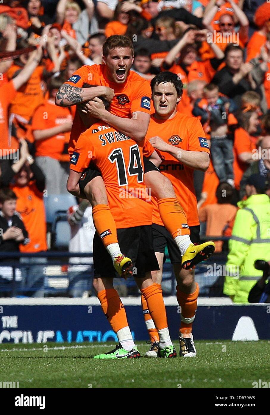 Dundee United's David Goodwillie celebrates with team mate Daniel Swanson (14) after he scores their sides first goal of the game Stock Photo