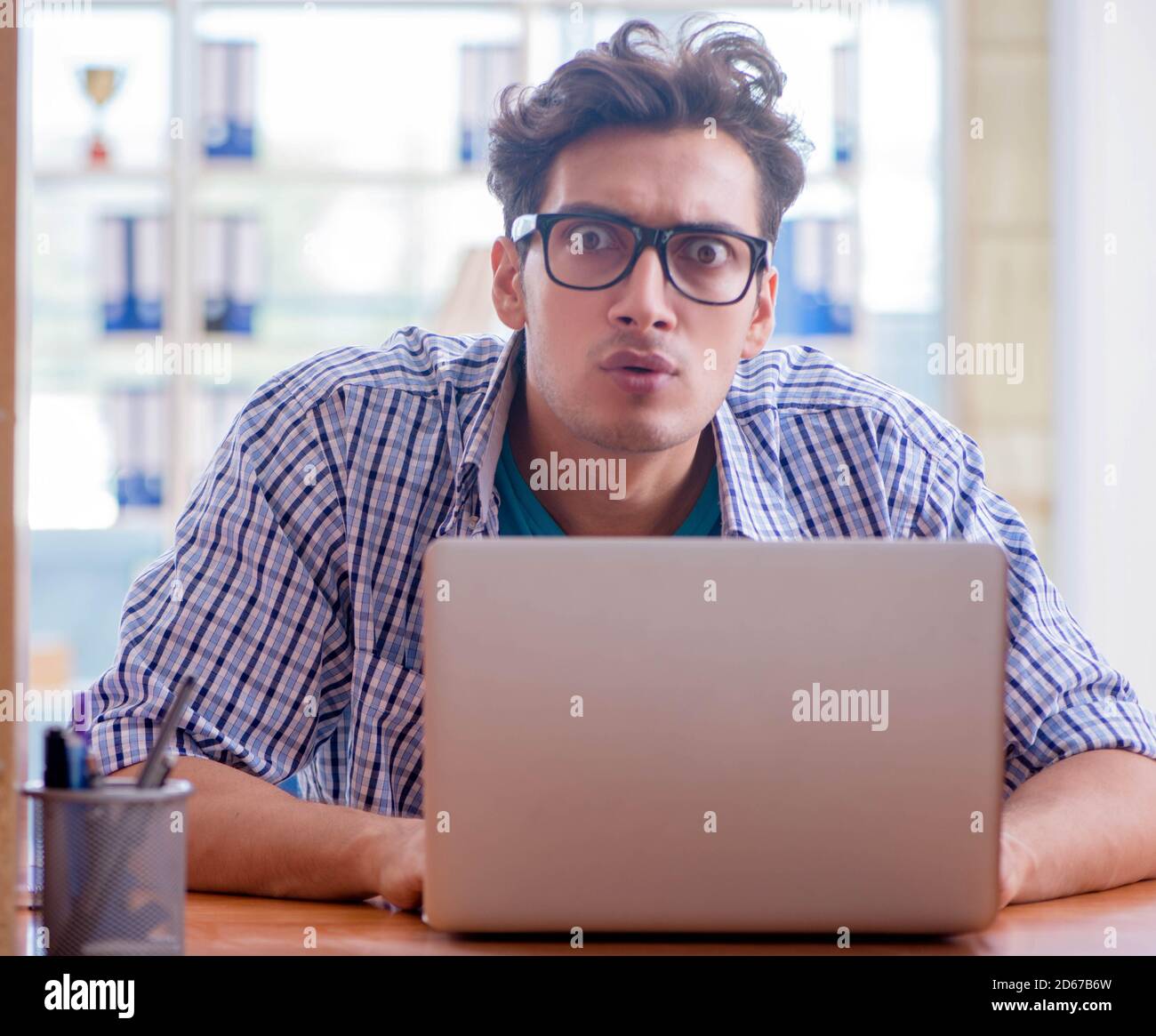 The student studying at home preparing for exam Stock Photo - Alamy