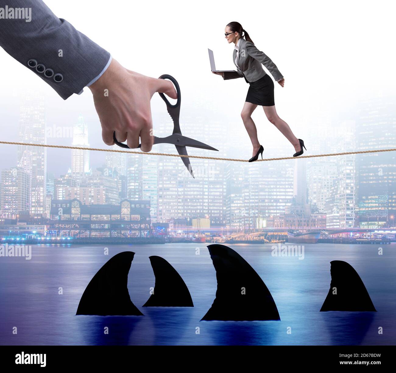 The hand cutting rope in business risk concept Stock Photo - Alamy