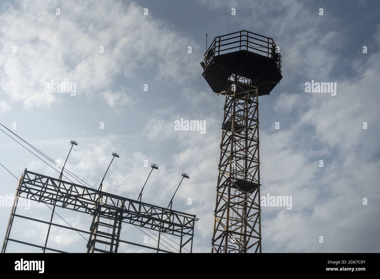 Low angle shot of a tower under the cloudy sky Stock Photo - Alamy