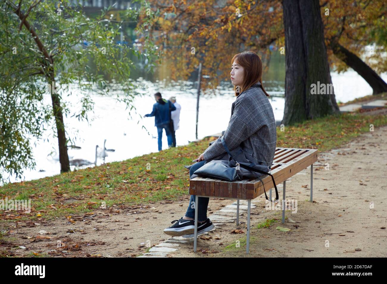 Woman alone hi-res stock photography and images - Alamy