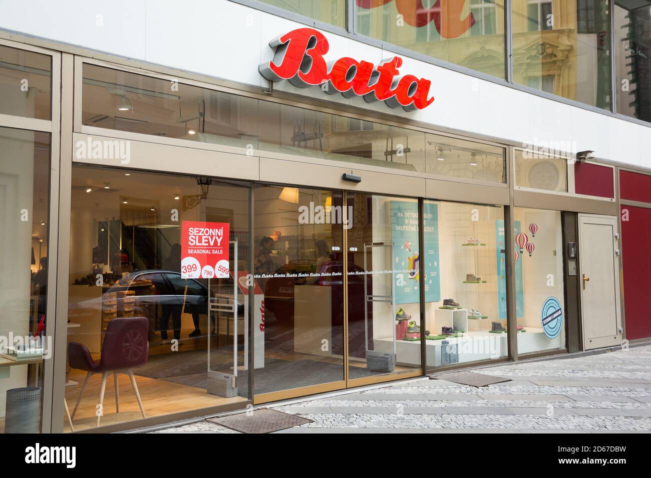 Shop exterior of a bata store in a busy shopping mall at night Stock Photo  - Alamy
