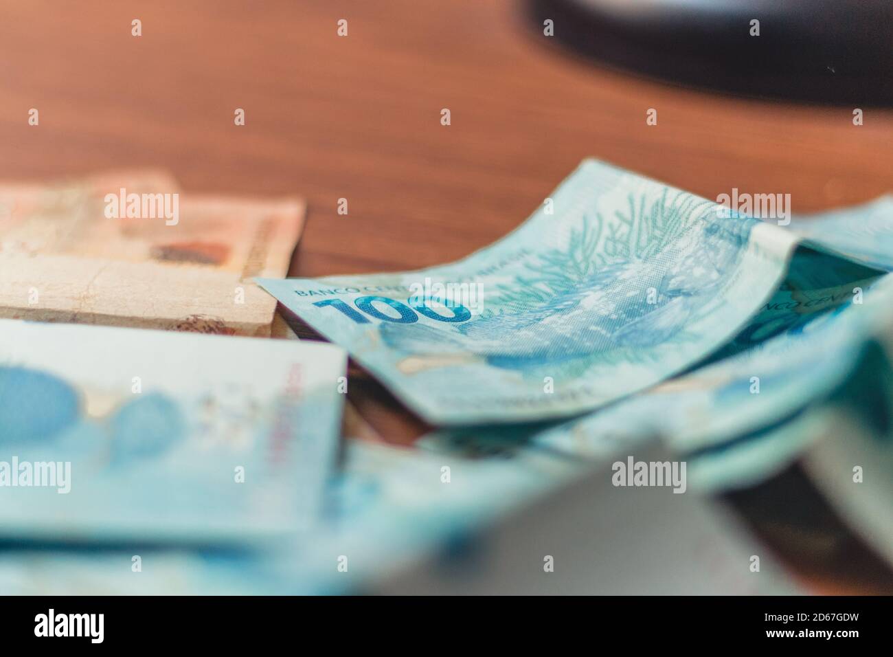 Money from Brazil. Notes of Real, and coins, Brazilian currency, Brazil BRL. Concept of savings, salary, payment and funds. Stock Photo