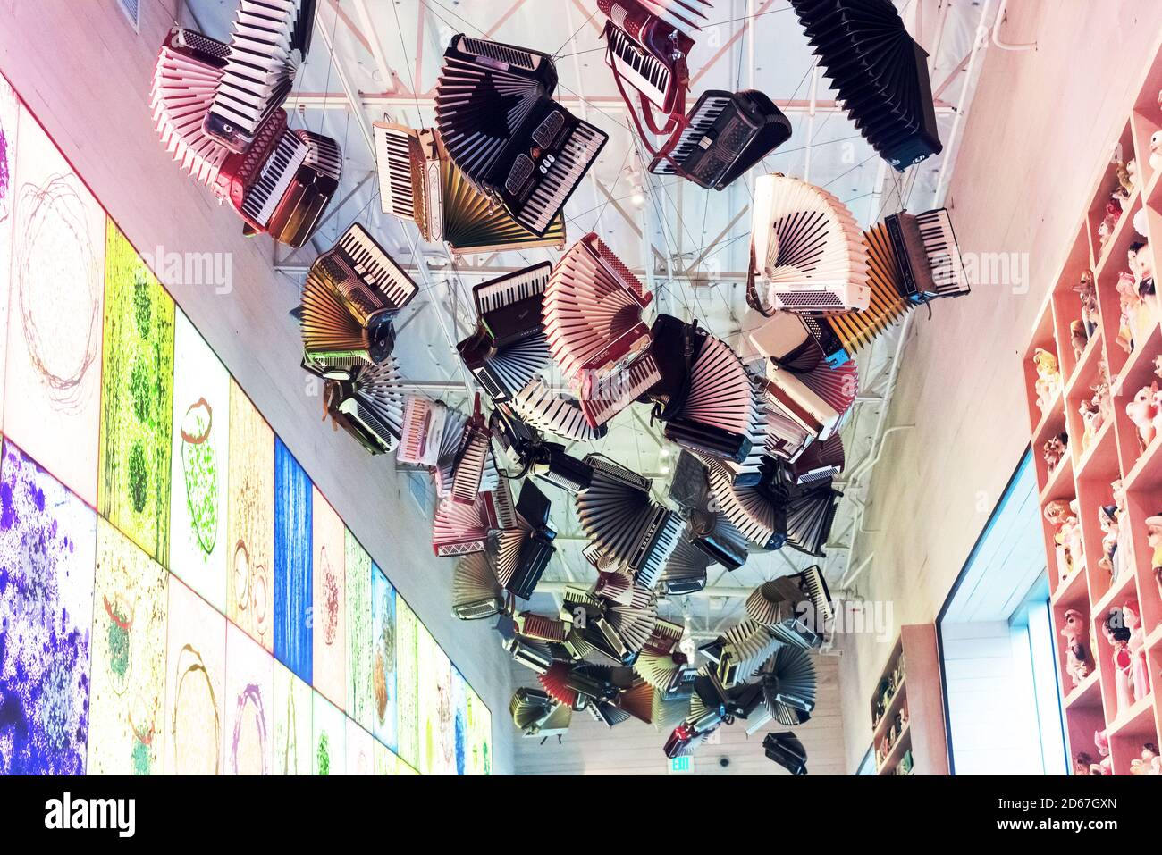 Cafe large collection of accordions hangs overhead , Chihuly Garden and Glass  museum , Seattle , USA Stock Photo