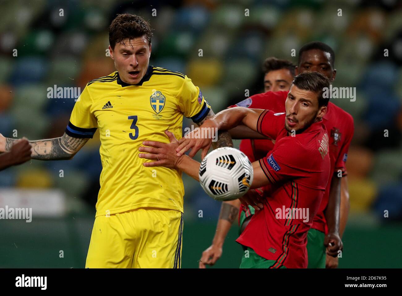 Lisbon, Portugal. 14th Oct, 2020. Ruben Dias (R) of Portugal defends Victor Lindelof of Sweden during their UEFA Nations League football match in Lisbon, Portugal, on Oct. 14, 2020. Credit: Pedro Fiuza/Xinhua/Alamy Live News Stock Photo