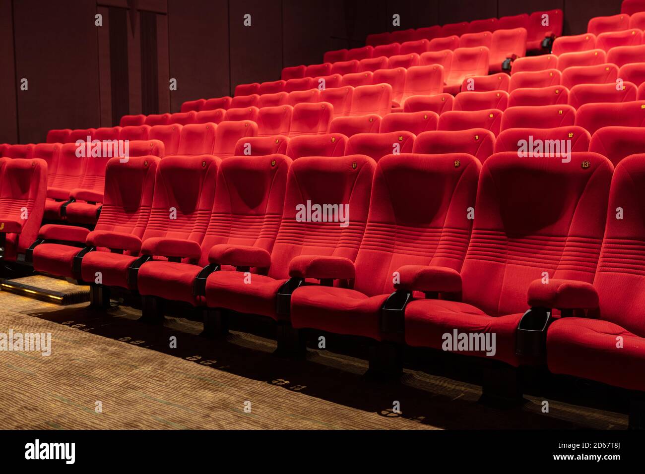 Empty Red Cinema Seat on Movie Theatre Stock Photo