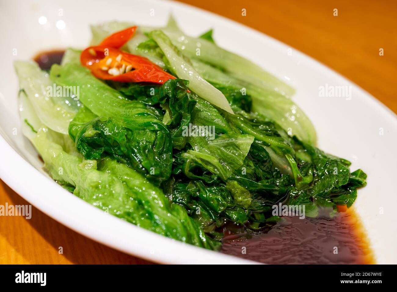 A Chinese Cantonese dish, boiled lettuce Stock Photo - Alamy