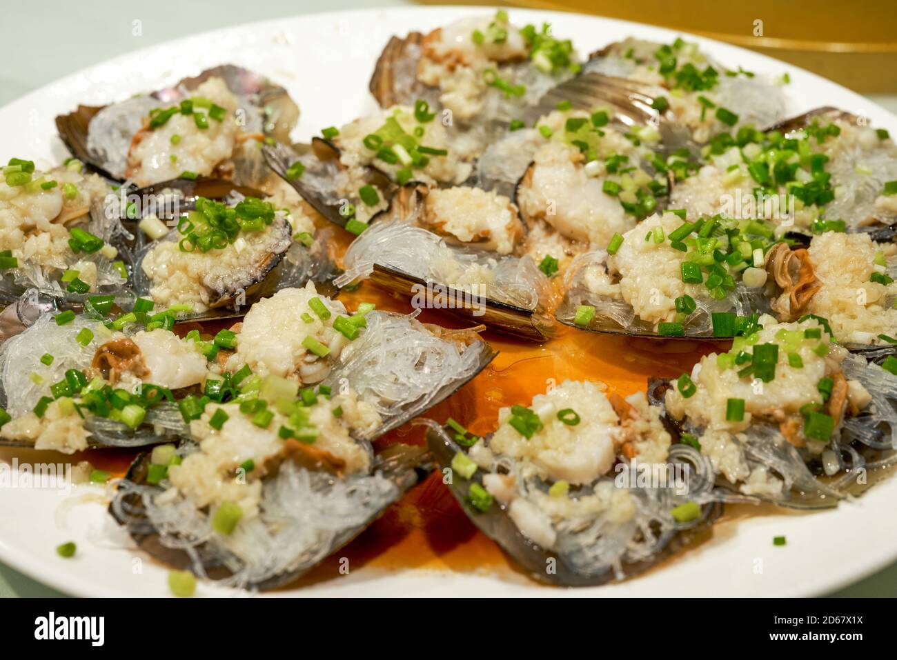 A delicious Cantonese dish, steamed scallops with black bean sauce