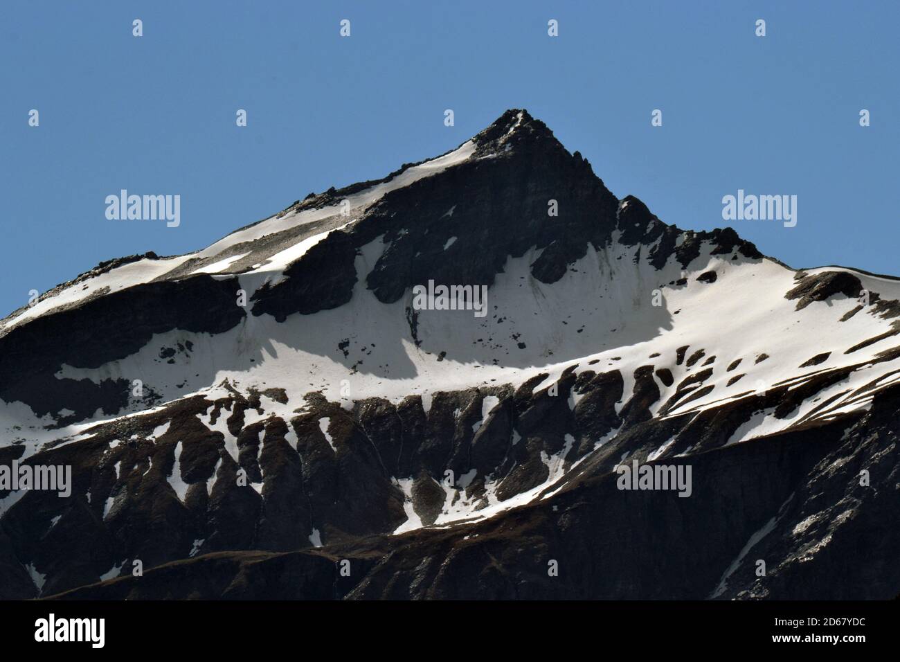 Summer snow coverage of Mount Aspiring, South Island, New Zealand Stock Photo