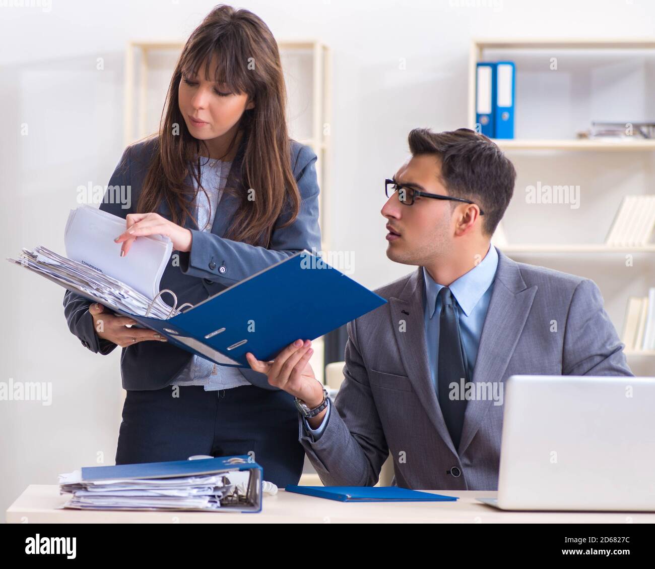 The man and woman working in the office Stock Photo - Alamy