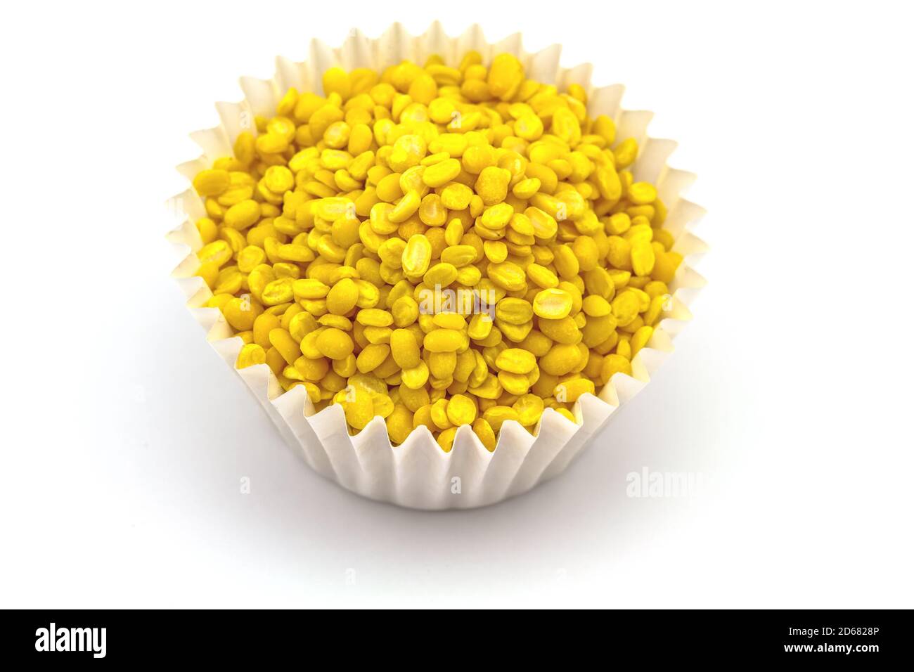 yellow bean in paper cup on white background Stock Photo